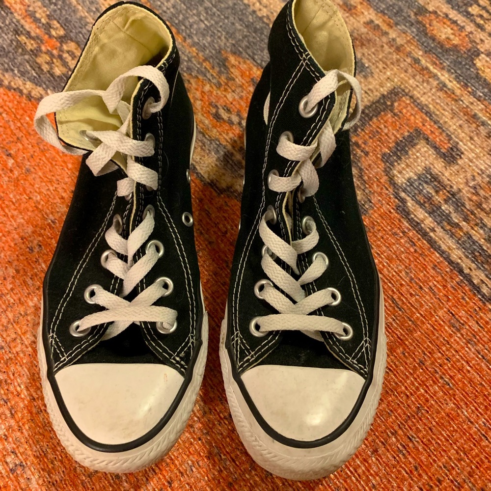 Chuck Taylor’s All Star Classic Converse black and white high top sneakers